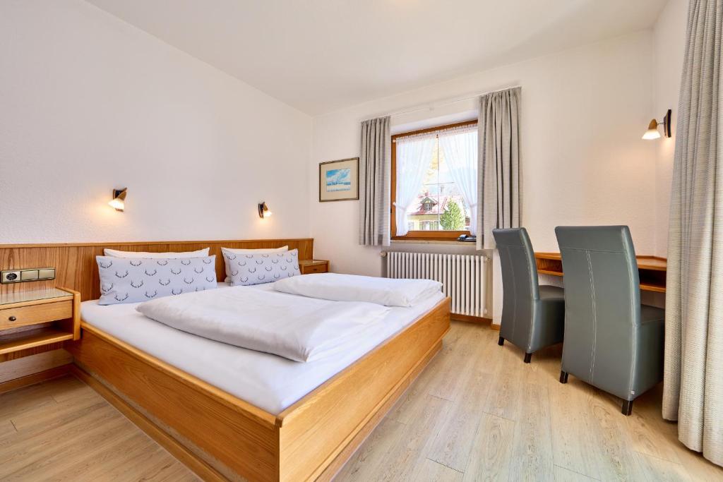Postel nebo postele na pokoji v ubytování Hotel Antonia