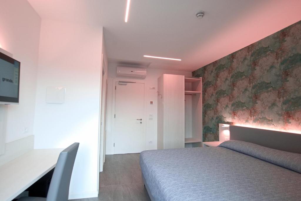 TV a/nebo společenská místnost v ubytování Hotel Paris