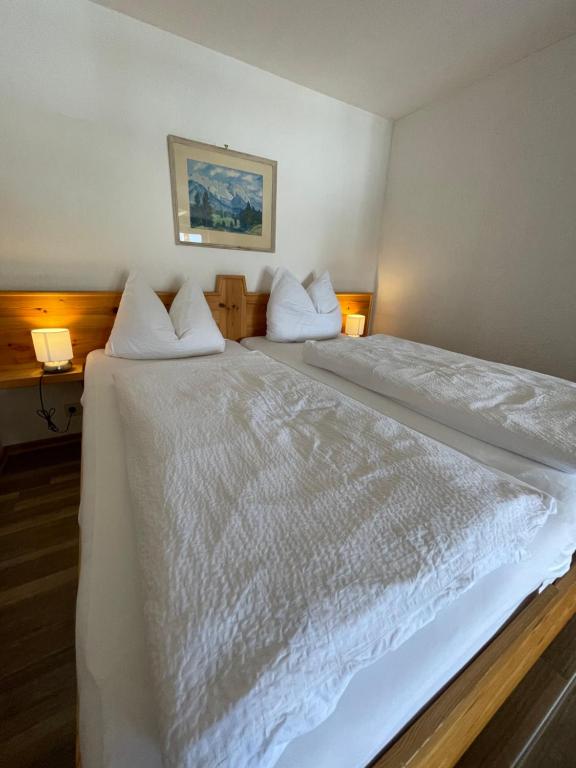 Postel nebo postele na pokoji v ubytování Gästehaus Gastl