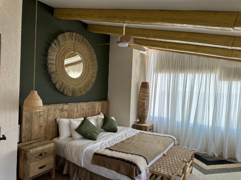 Posteľ alebo postele v izbe v ubytovaní Botanico Boutique Hotel