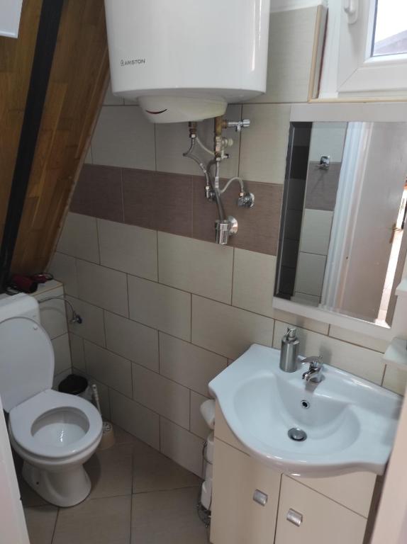 Kúpeľňa v ubytovaní Tavasz apartman