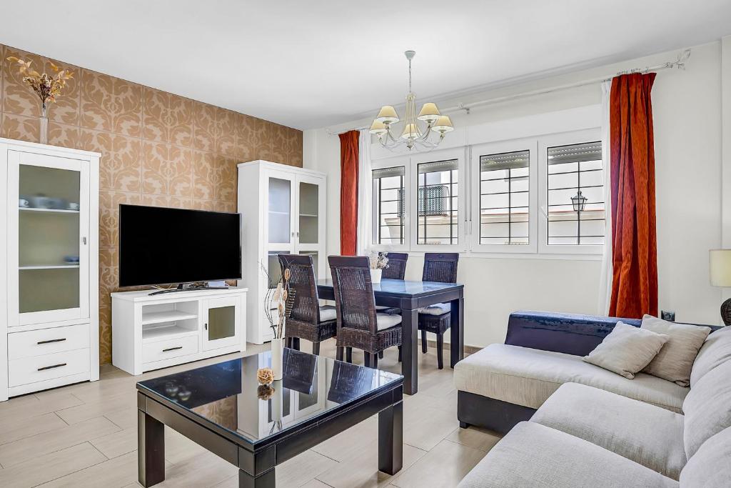 Μια τηλεόραση ή/και κέντρο ψυχαγωγίας στο Apartamento Aryan - sólo familias