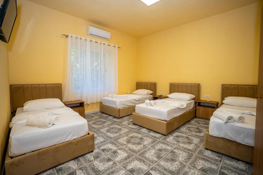 Katil atau katil-katil dalam bilik di Siesta Hostel - City Center