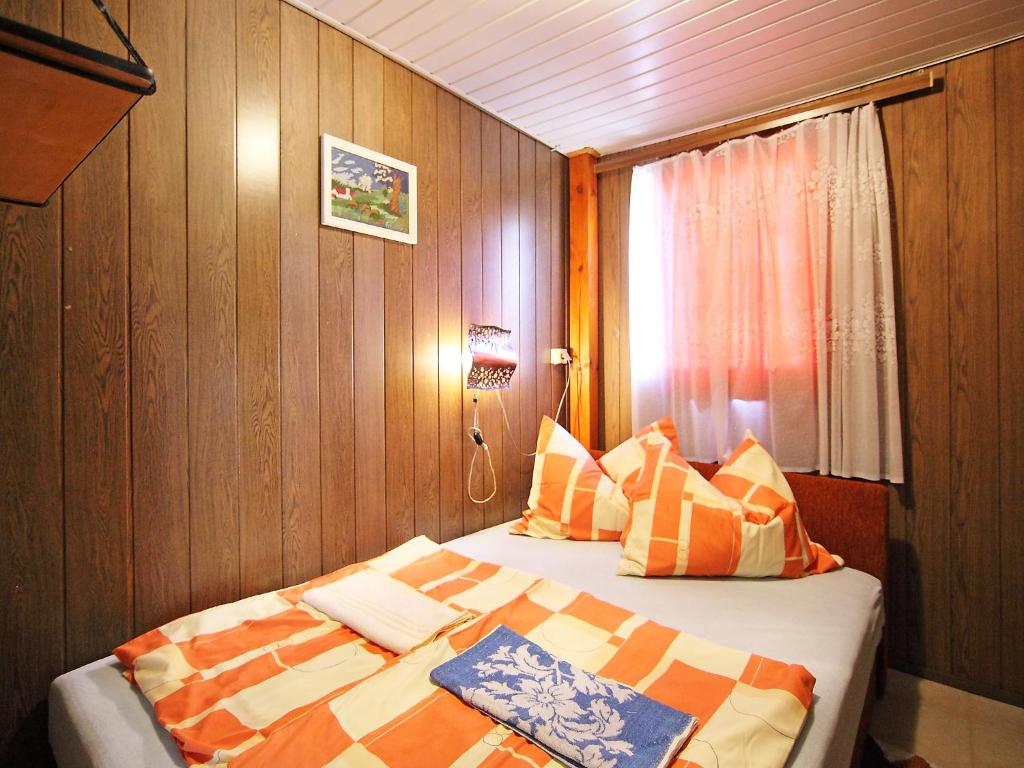 Posteľ alebo postele v izbe v ubytovaní Chalet Rosso by Interhome