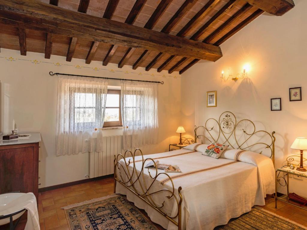 Łóżko lub łóżka w pokoju w obiekcie Holiday Home Casa Graziani-1 by Interhome