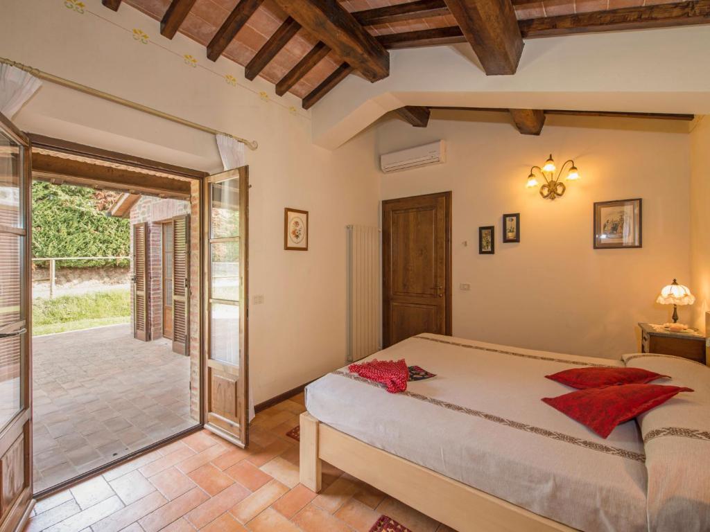 Łóżko lub łóżka w pokoju w obiekcie Holiday Home Casa Graziani-1 by Interhome