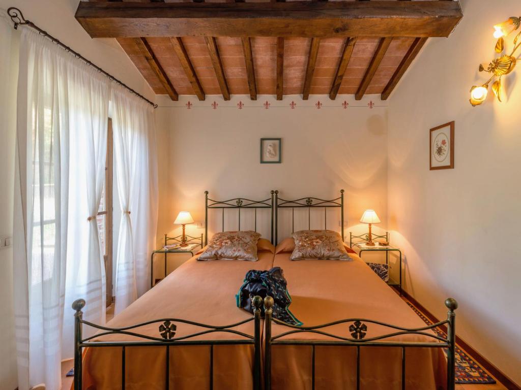 Łóżko lub łóżka w pokoju w obiekcie Holiday Home Casa Graziani-1 by Interhome