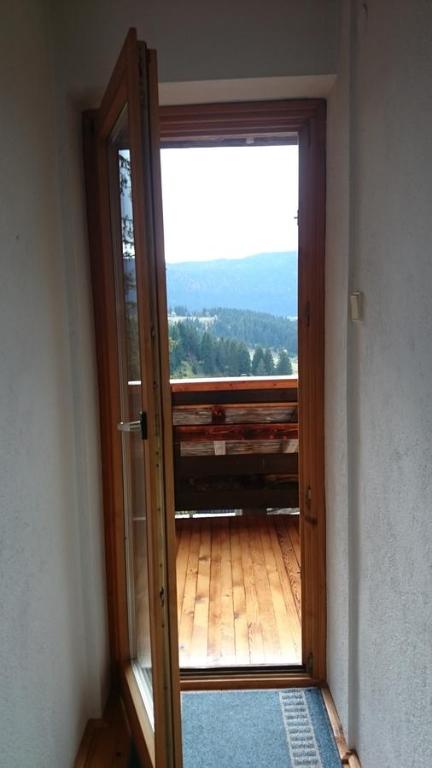 an open door to a balcony with a view at Apartments A Vlasic in Vlasic