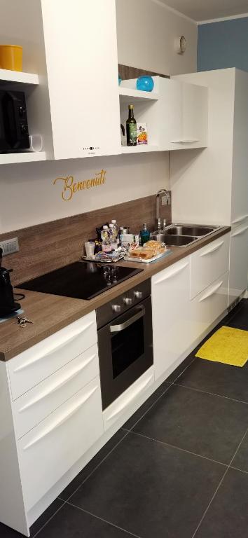Kuchyň nebo kuchyňský kout v ubytování Bloom Apartment