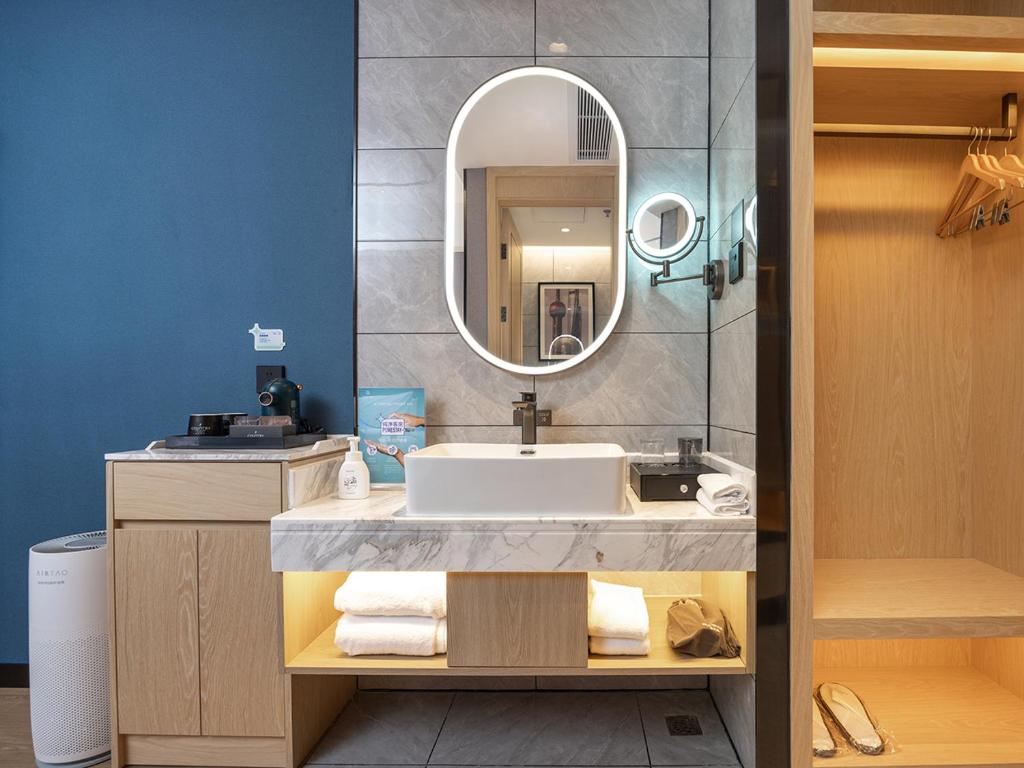 Koupelna v ubytování Country Inn & Suites by Radisson Shenzhen International Convention and Exhibition Center
