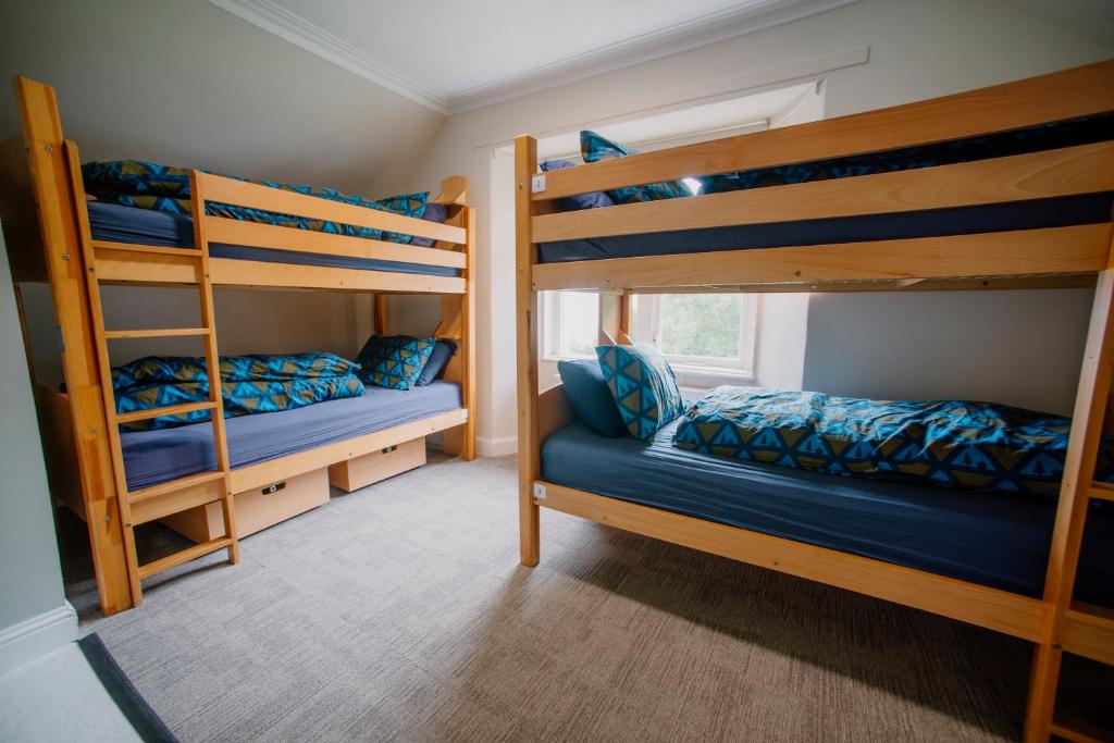 Postel nebo postele na pokoji v ubytování Rowardennan Youth Hostel
