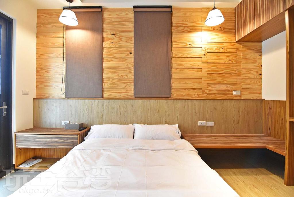 Postel nebo postele na pokoji v ubytování Captain Ou Homestay