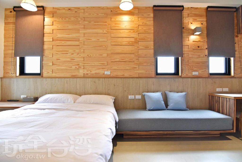Postel nebo postele na pokoji v ubytování Captain Ou Homestay