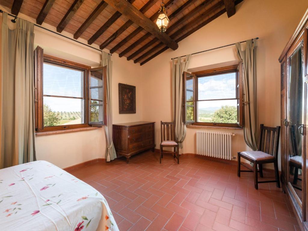 Łóżko lub łóżka w pokoju w obiekcie Holiday Home Poggio Campana by Interhome