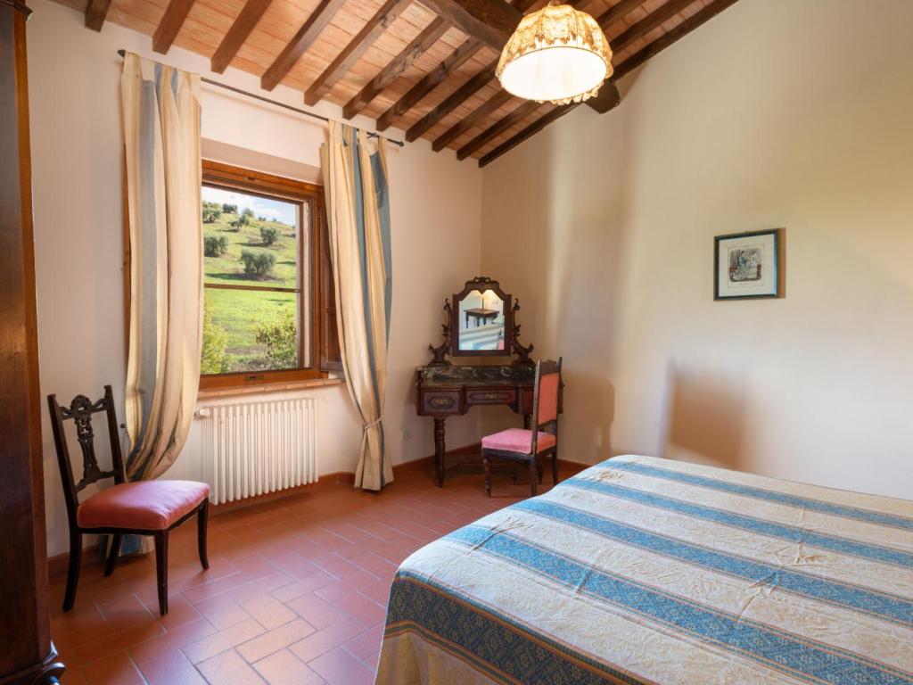 Łóżko lub łóżka w pokoju w obiekcie Holiday Home Poggio Campana by Interhome
