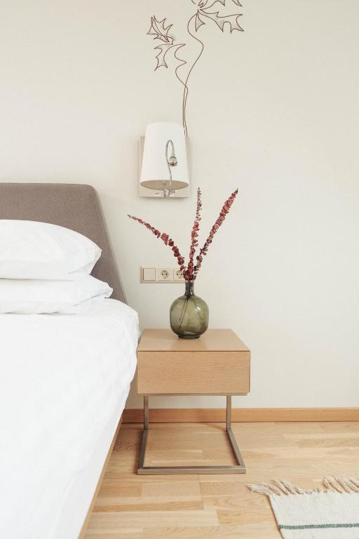 Postel nebo postele na pokoji v ubytování Mana Suites & Sea