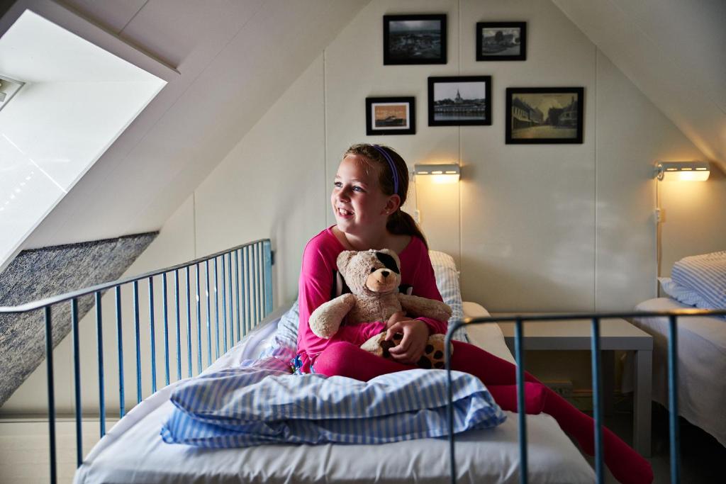 Postel nebo postele na pokoji v ubytování Danhostel Frederikshavn City