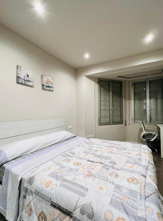 Postel nebo postele na pokoji v ubytování Camp Nou Nueva Casa