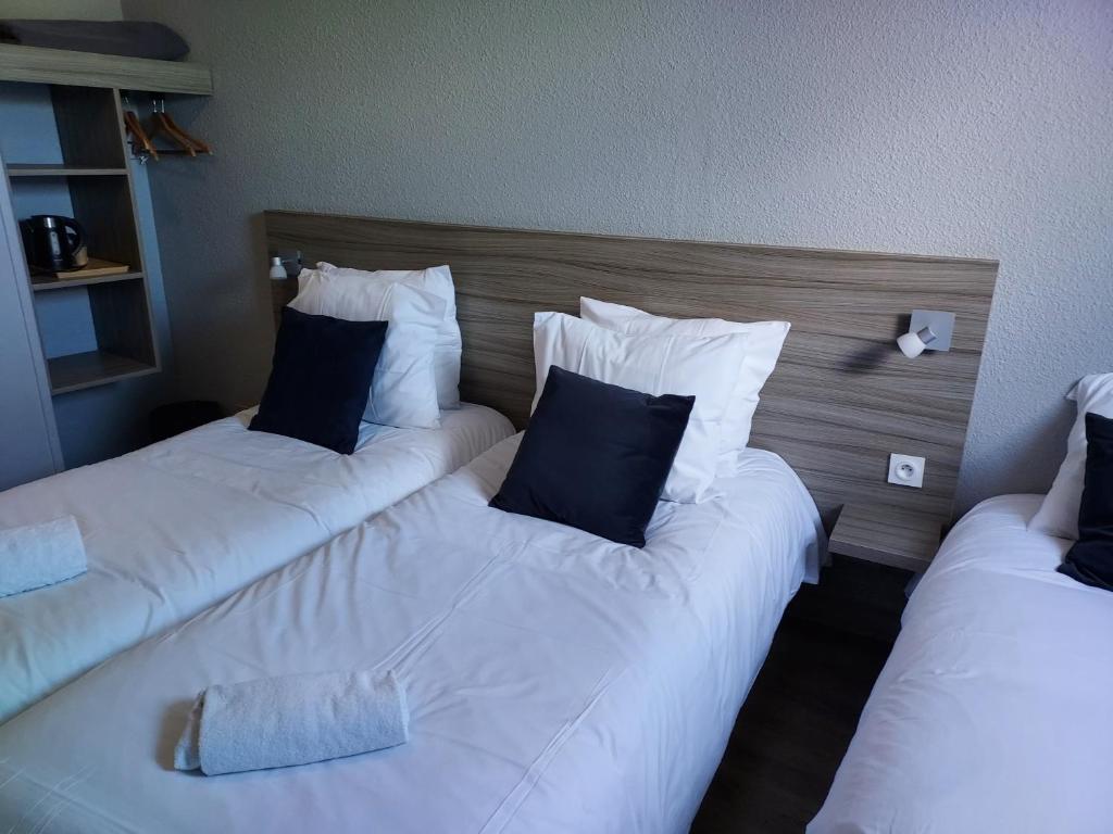 Postel nebo postele na pokoji v ubytování Hotel Eisenhower