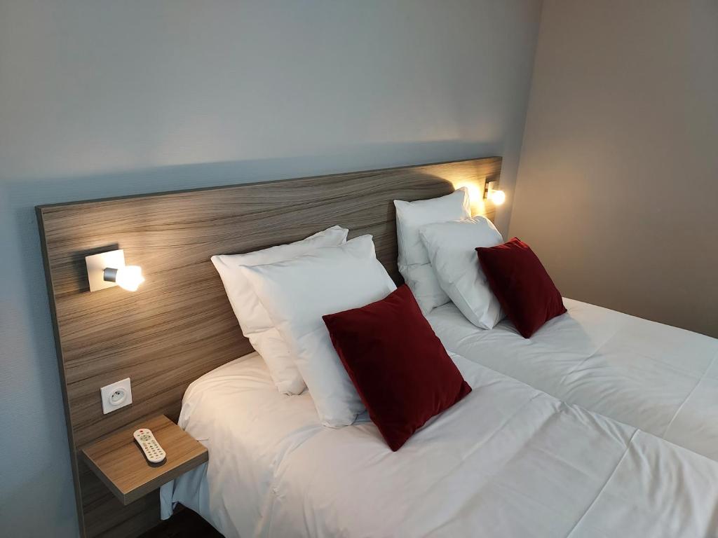 Postel nebo postele na pokoji v ubytování Hotel Eisenhower
