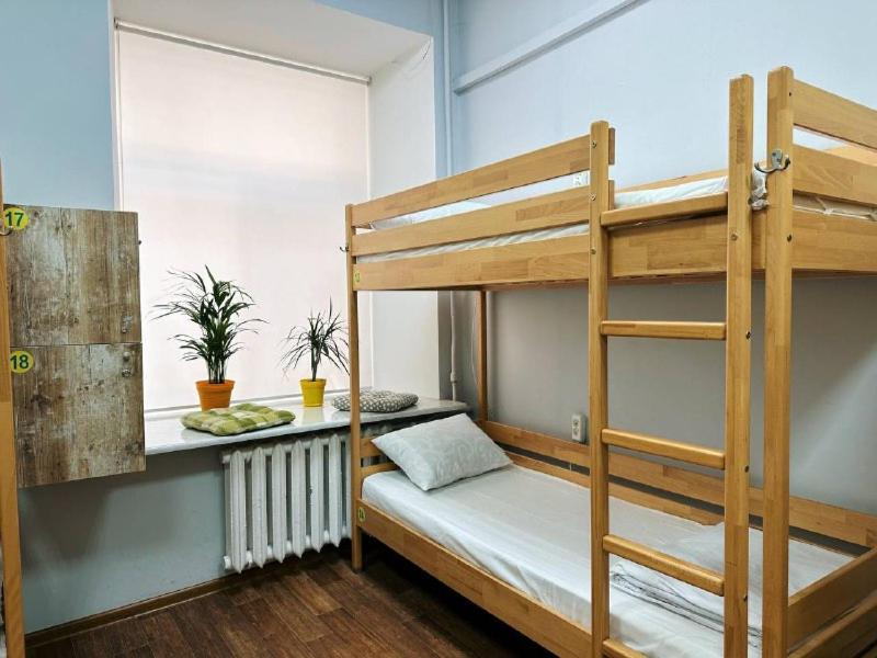 Postel nebo postele na pokoji v ubytování Hostel51