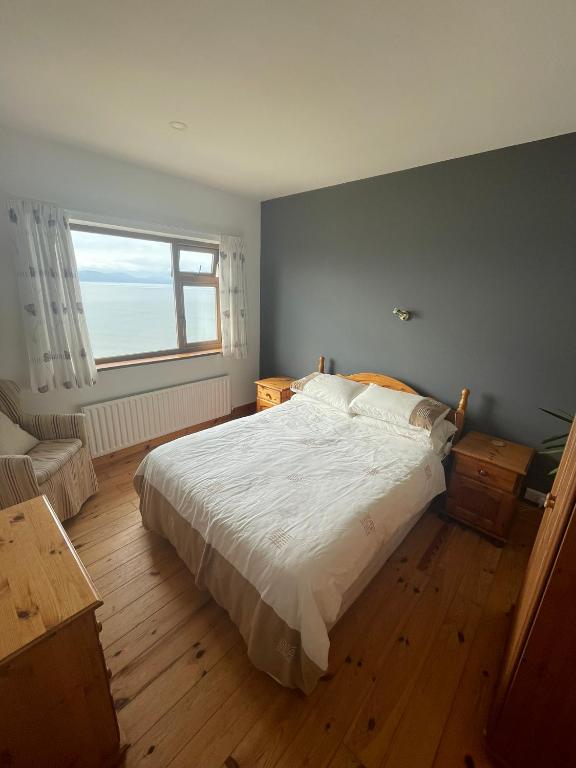 Postel nebo postele na pokoji v ubytování Shamrock Cottage