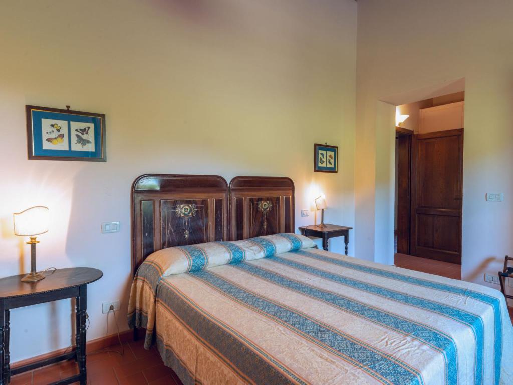 Łóżko lub łóżka w pokoju w obiekcie Holiday Home Poggio Campana by Interhome
