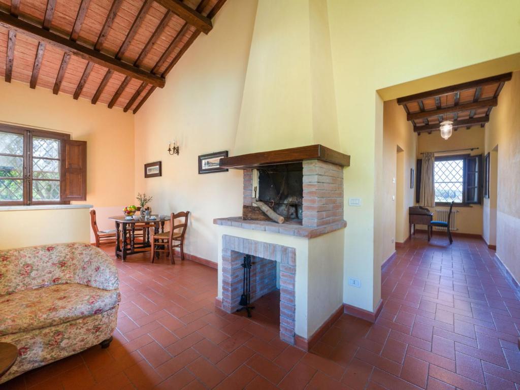 Telewizja i/lub zestaw kina domowego w obiekcie Holiday Home Poggio Campana by Interhome