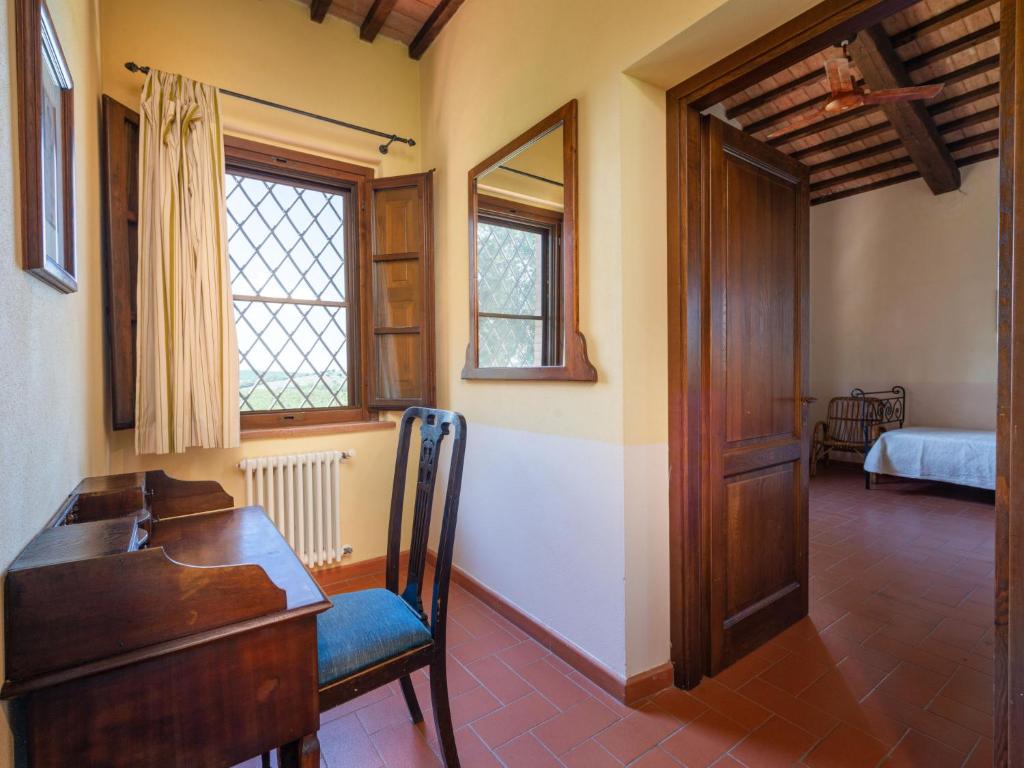 Łóżko lub łóżka w pokoju w obiekcie Holiday Home Poggio Campana by Interhome
