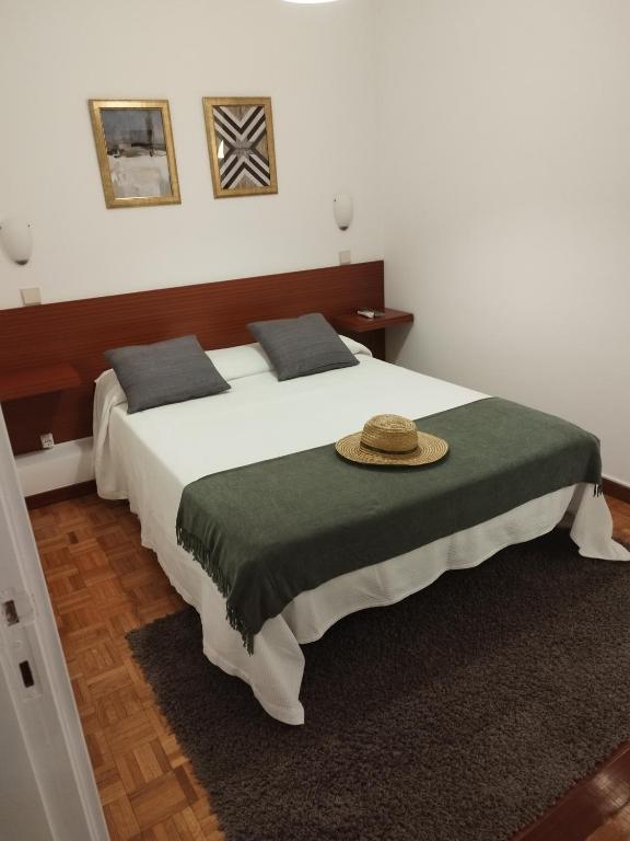 Postel nebo postele na pokoji v ubytování Aconchego do Lar