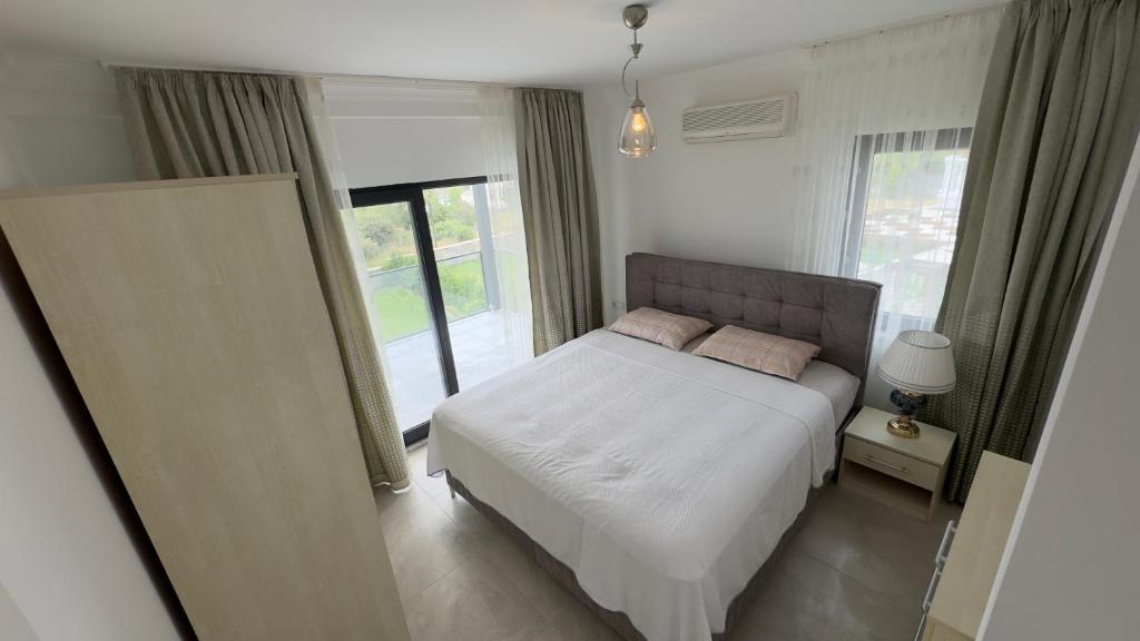 Postel nebo postele na pokoji v ubytování Villa Akasya with private pool