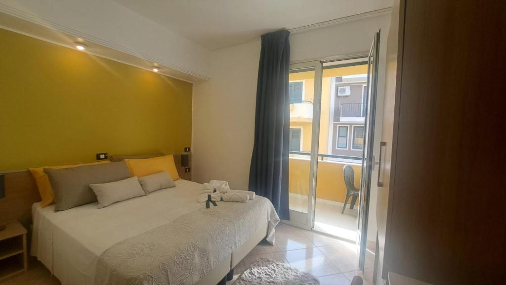 Postel nebo postele na pokoji v ubytování MariMare B&B