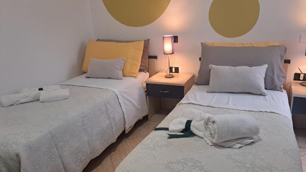 Postel nebo postele na pokoji v ubytování MariMare B&B
