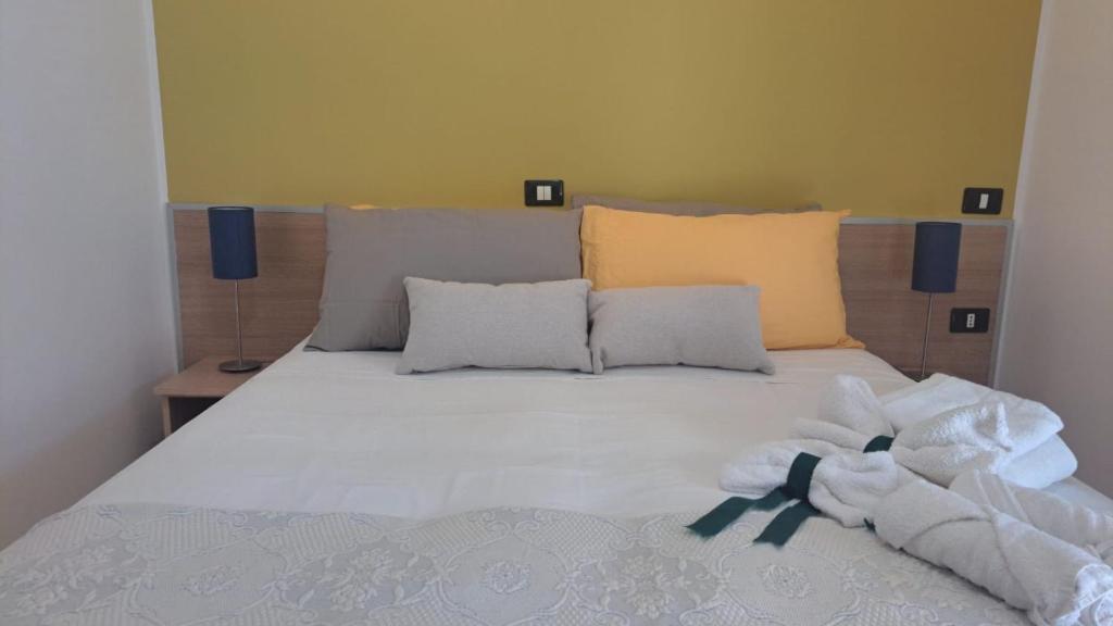 Postel nebo postele na pokoji v ubytování MariMare B&B