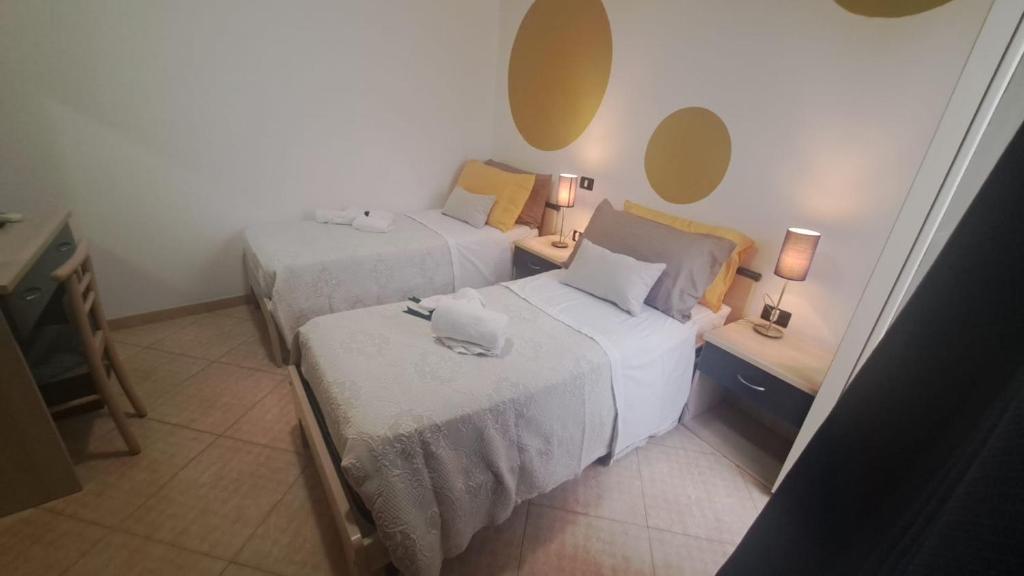 Postel nebo postele na pokoji v ubytování MariMare B&B