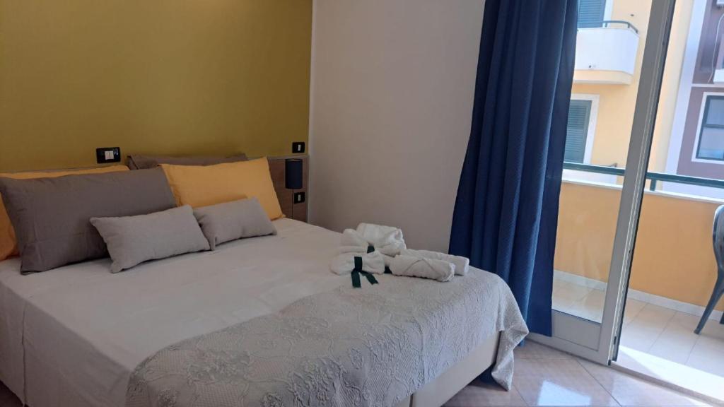 Postel nebo postele na pokoji v ubytování MariMare B&B