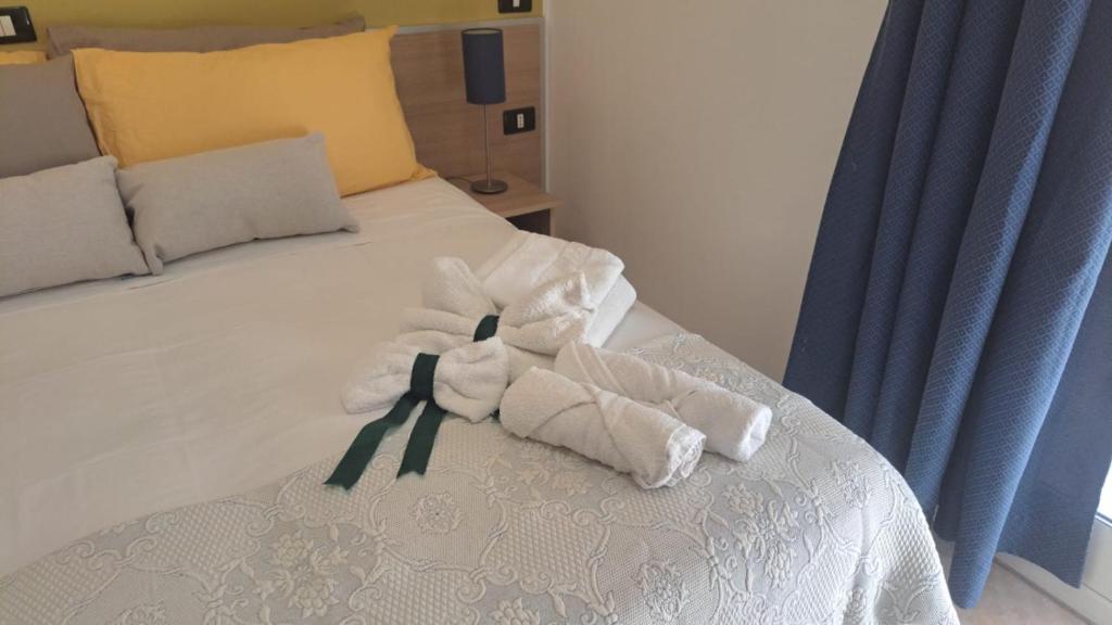 Postel nebo postele na pokoji v ubytování MariMare B&B