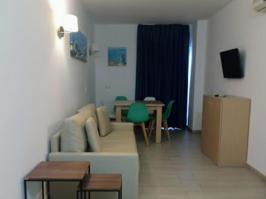 TV a/nebo společenská místnost v ubytování Apartamentos Orvay
