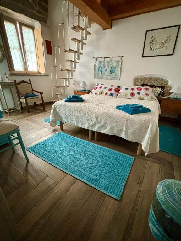 Postel nebo postele na pokoji v ubytování B&B Pascal House Nuoro_IUN E5016