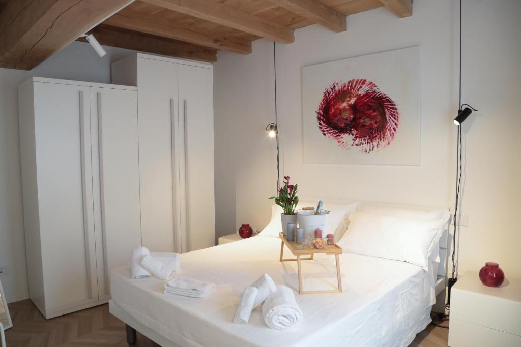 En eller flere senge i et værelse på Guest House Santo Stefano 2