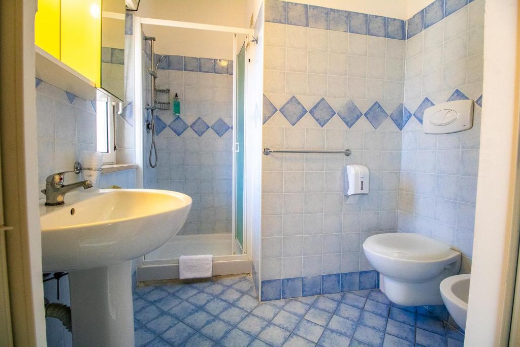 Koupelna v ubytování Di Matteo Hotel