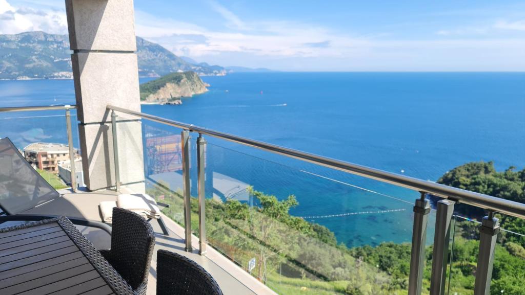 a balcony with a view of the ocean at Altezza Luxury Apartment 11 in Budva