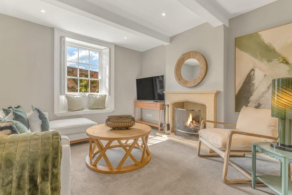 TV a/nebo společenská místnost v ubytování The Stone House