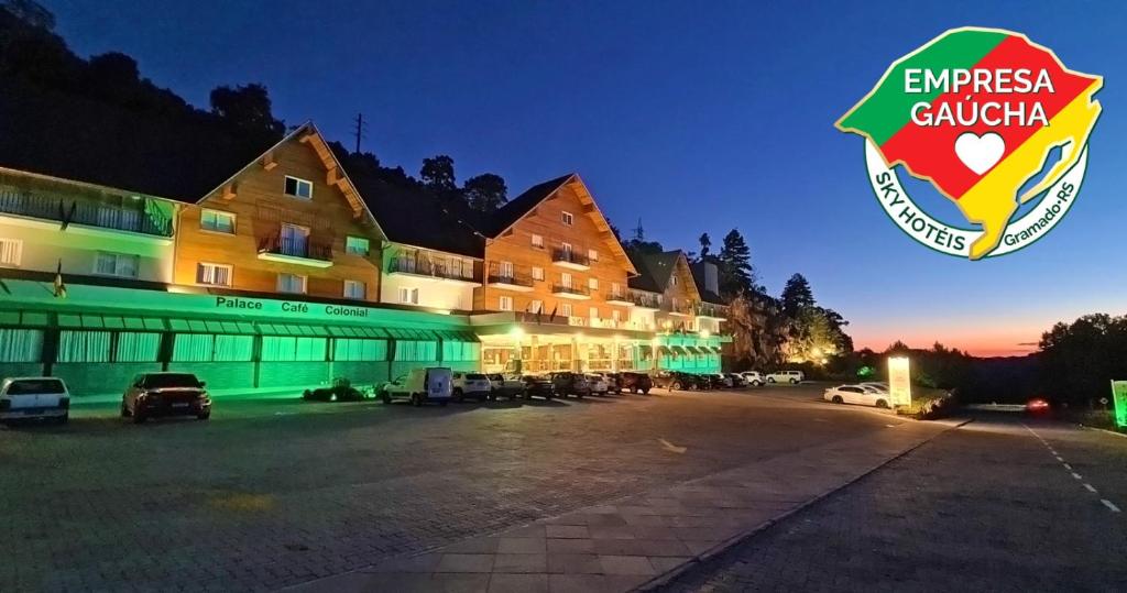 a building with a sign that reads embassy calacha at Sky Palace Hotel in Gramado