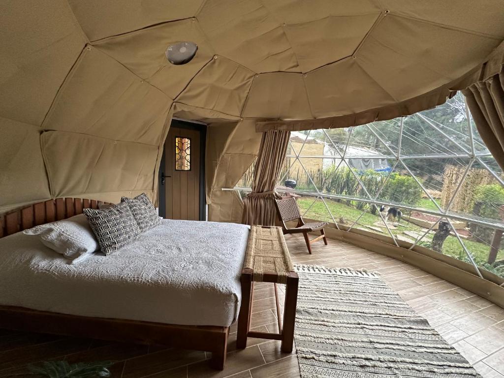 Postel nebo postele na pokoji v ubytování Lunada Glamping