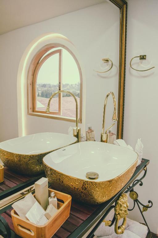 Koupelna v ubytování Örök Hotel