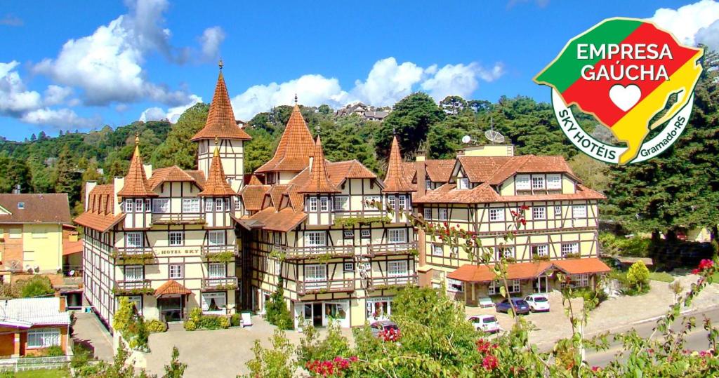 a large building with turrets on top of it at Hotel Sky Gramado in Gramado
