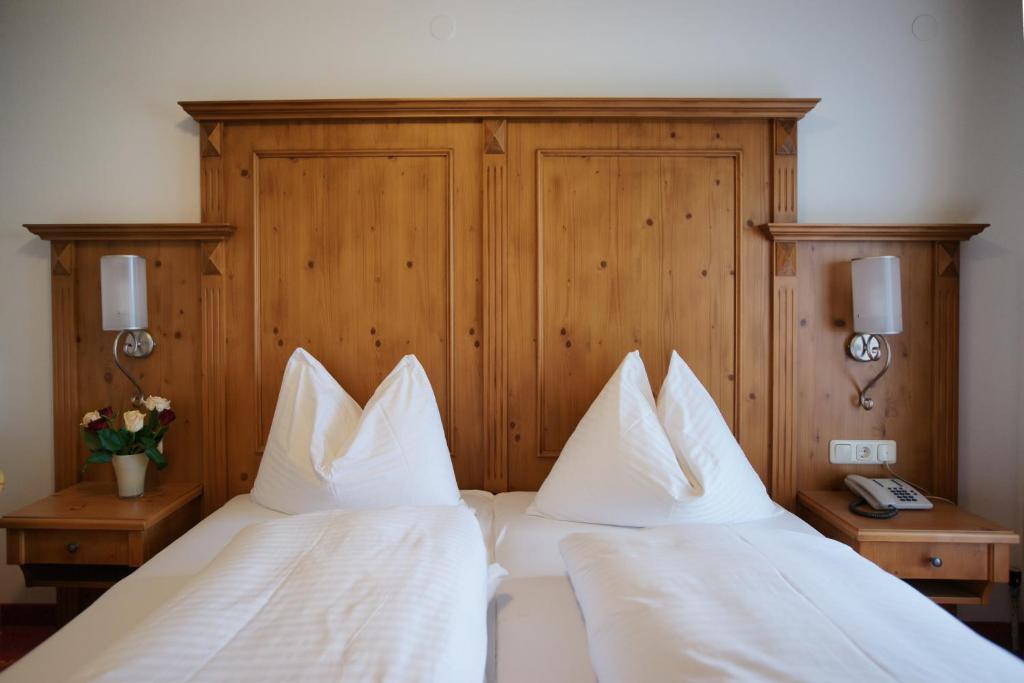 Posteľ alebo postele v izbe v ubytovaní Ferienhotel Tyrol Söll am Wilden Kaiser