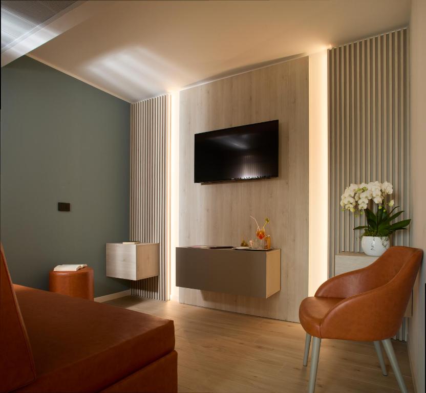 TV a/nebo společenská místnost v ubytování Hotel Pelikan