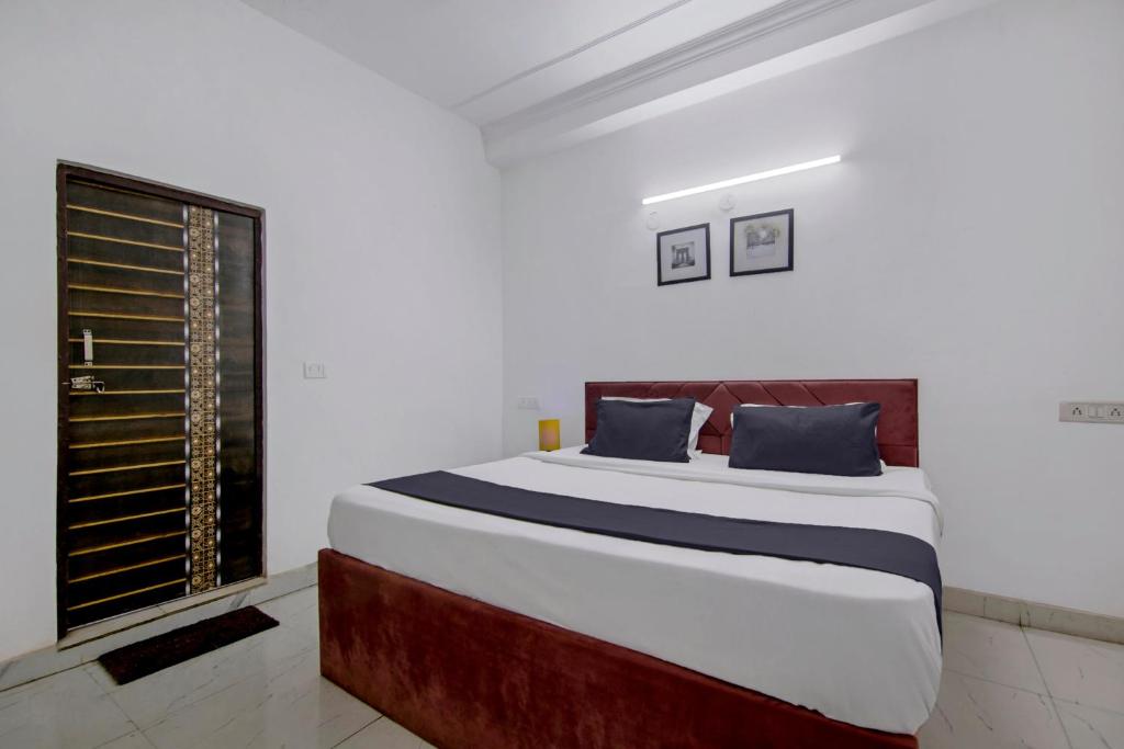 Postel nebo postele na pokoji v ubytování Hotel O Relax Inn